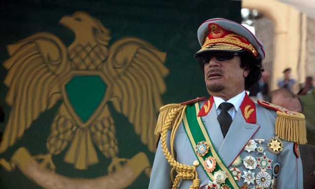 Muammar Gaddafi: Revolutionary Hero or Ruthless Strongman?