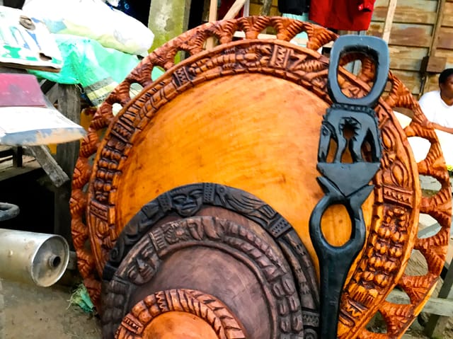 Carved wooden Opon Ifa divination trays.
