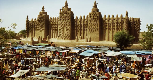 The Great Mosque of Djenné, a mud-brick landmark in the city that succeeded ancient Jenne-Jeno in Mali.