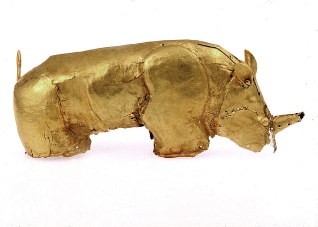 The golden rhinoceros of Mapungubwe, a palm-sized figurine of gold foil over a wooden core, unearthed from a royal grave in 1932.